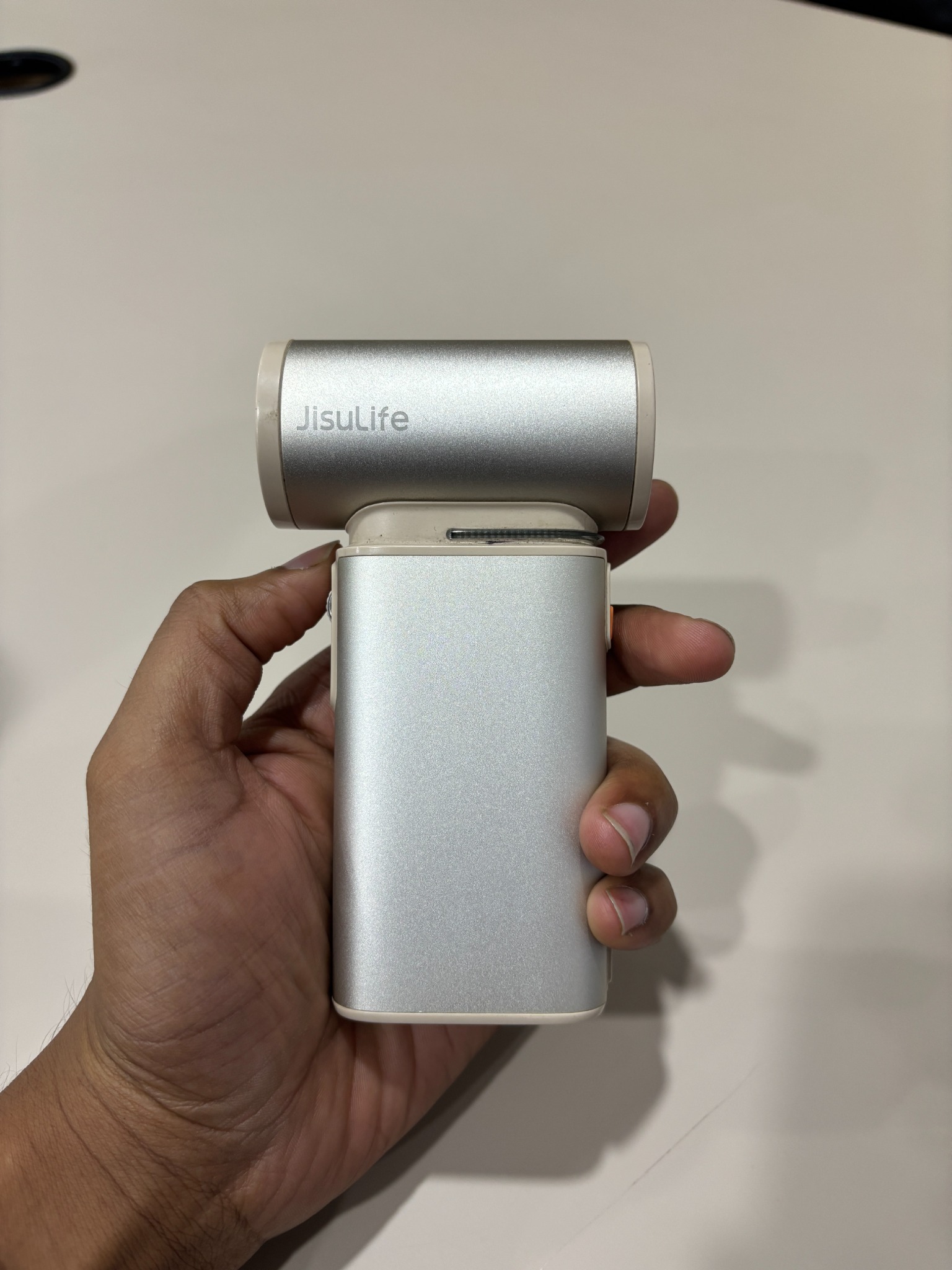 Actual silver JisuLife handheld fan
